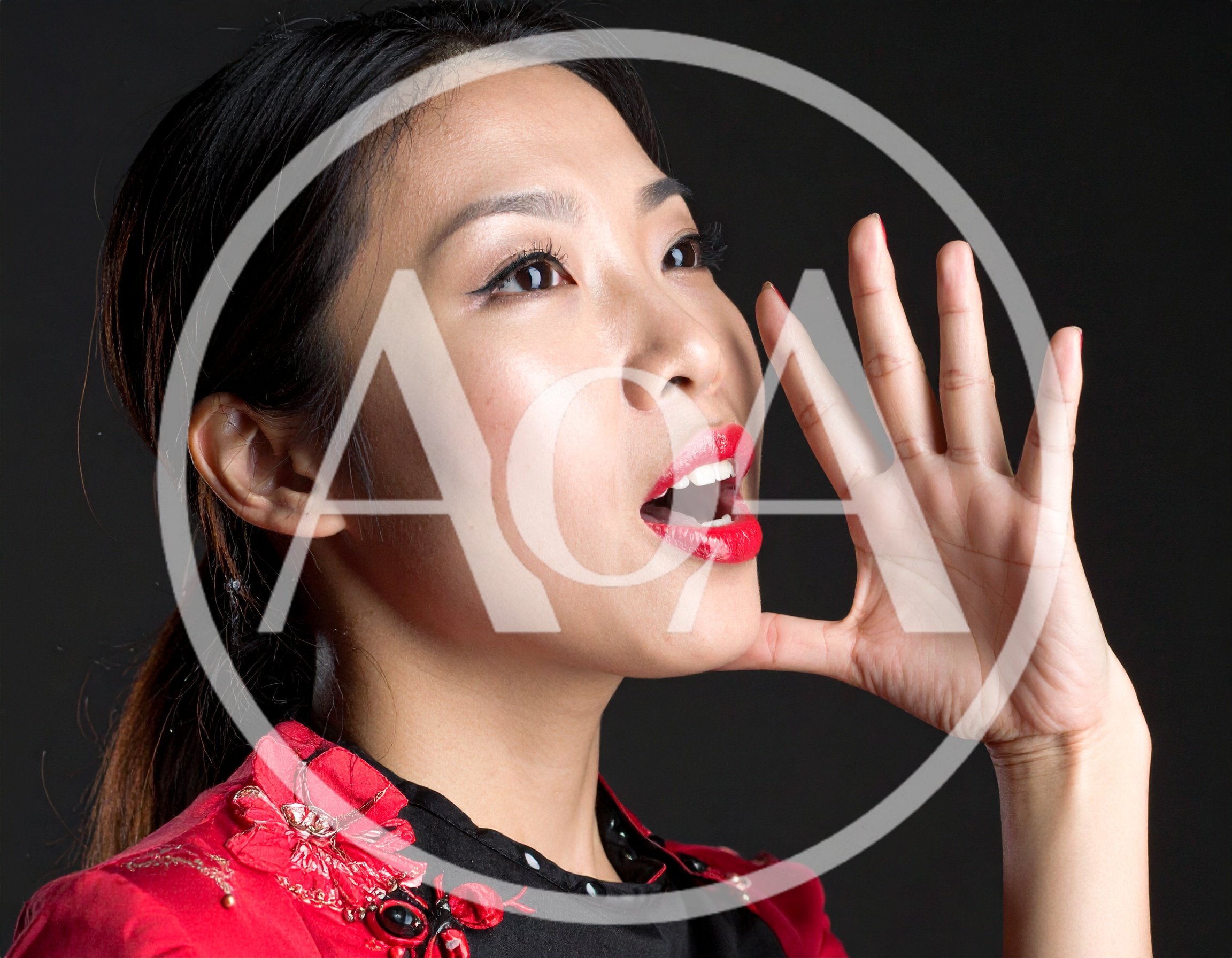 Asian Woman Calling Out With Hand Near Mouth