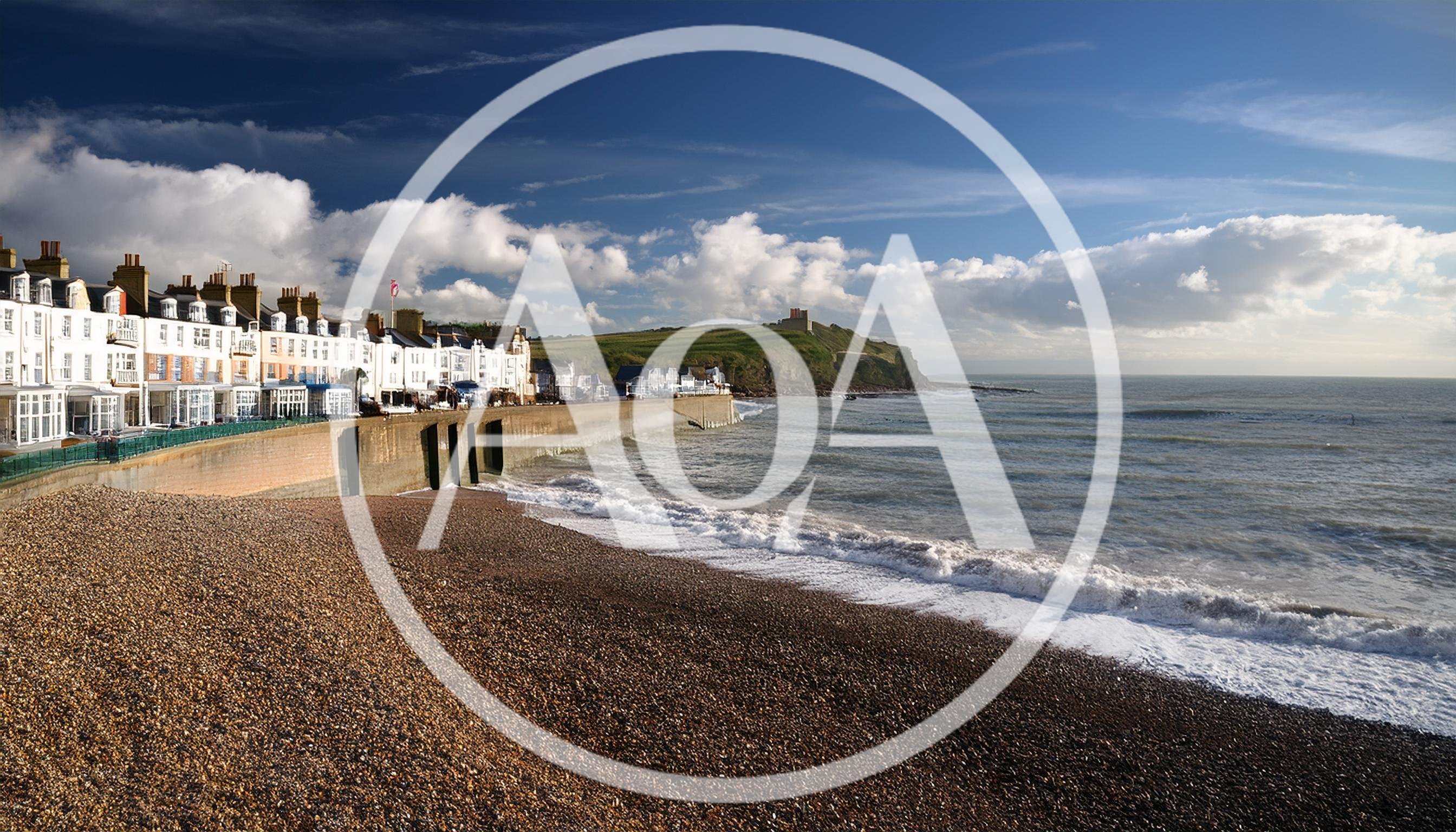 Lyme Regis Coastal Townscape And Pebble Beach