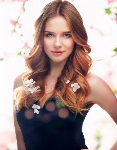 Portrait Of A Beautiful Woman With Spring Flowers