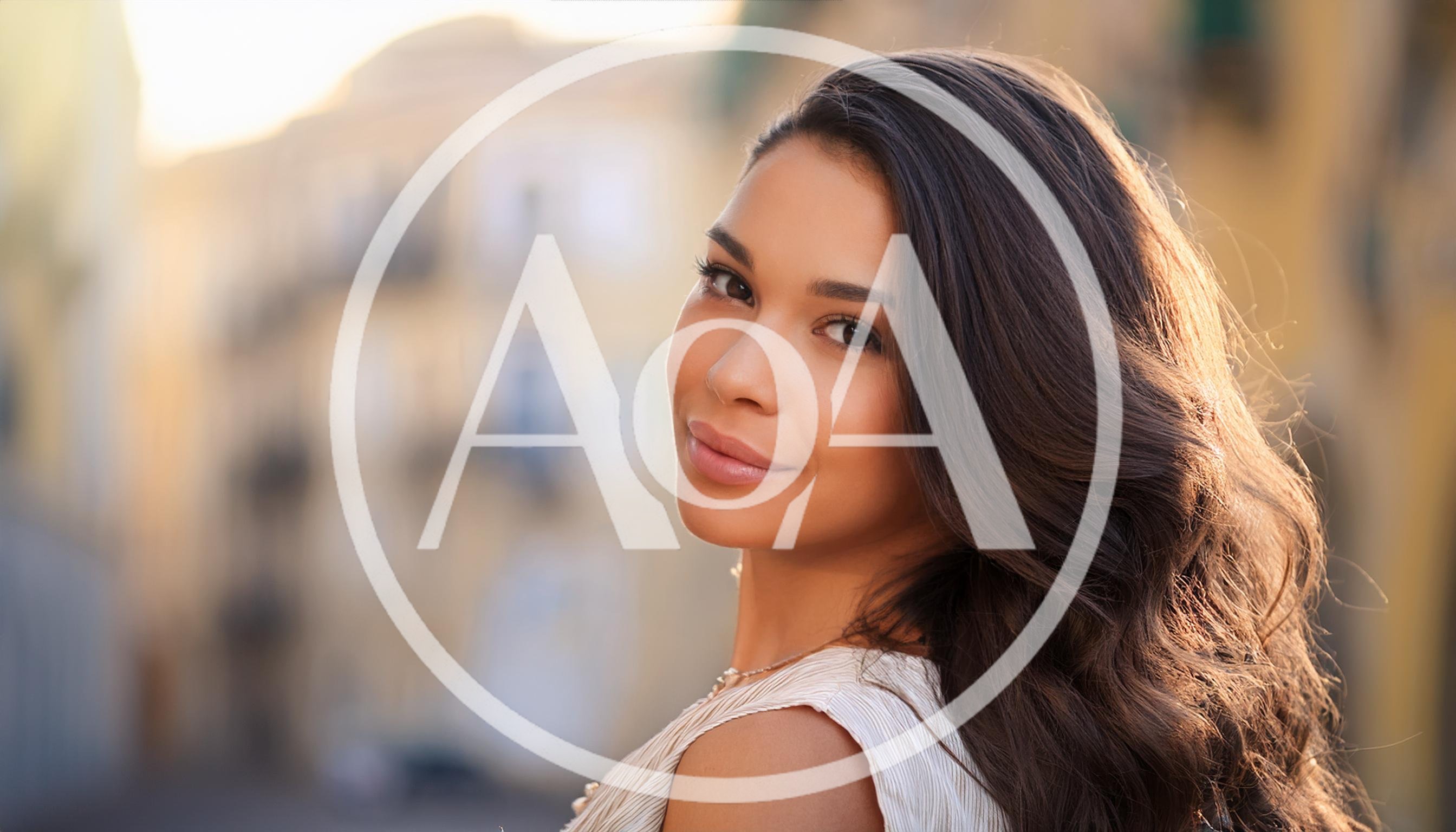 Portrait Of A Beautiful Young Woman Looking Back