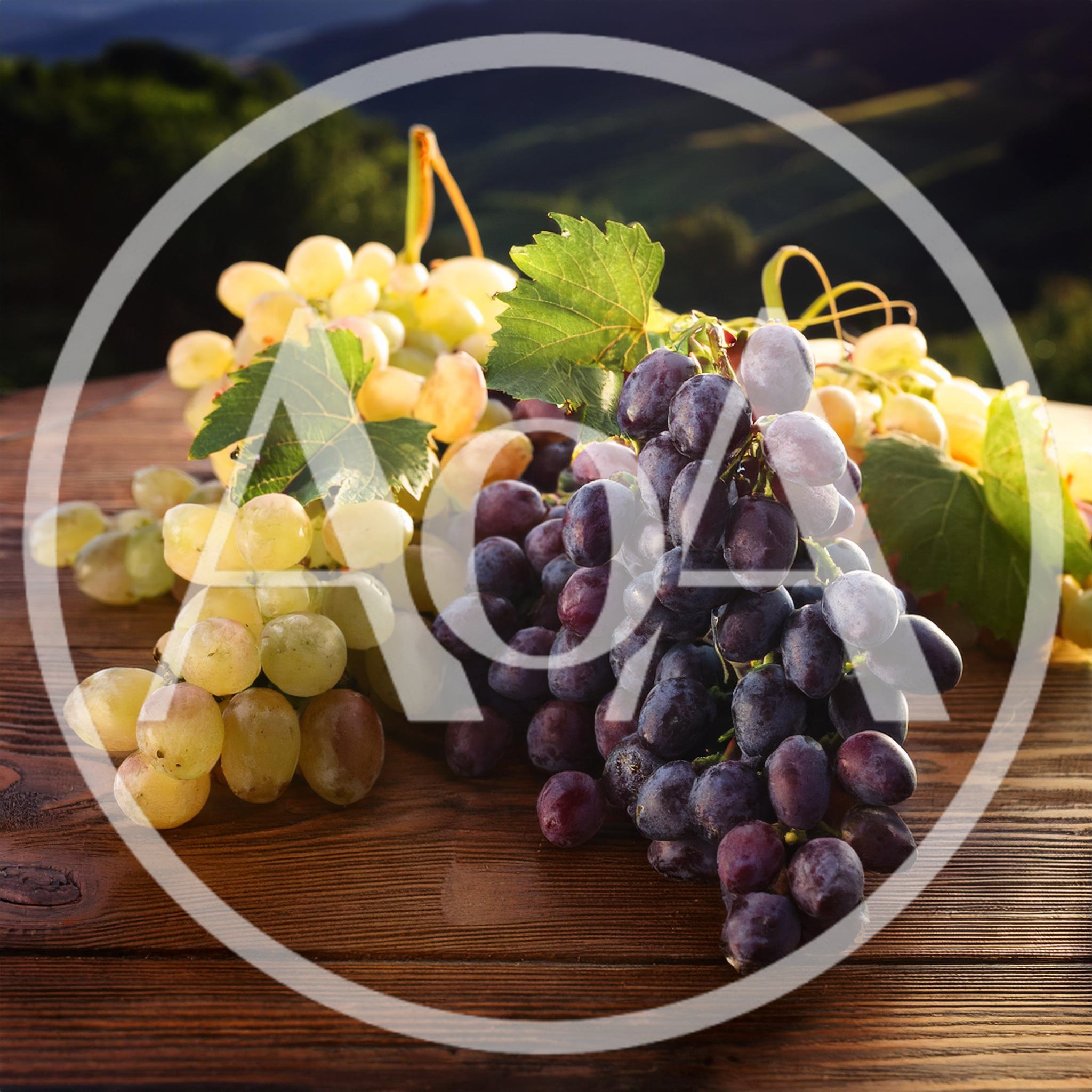Fresh Green and Purple Grapes on Wooden Table