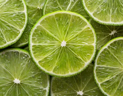Fresh Green Lime Slices Background