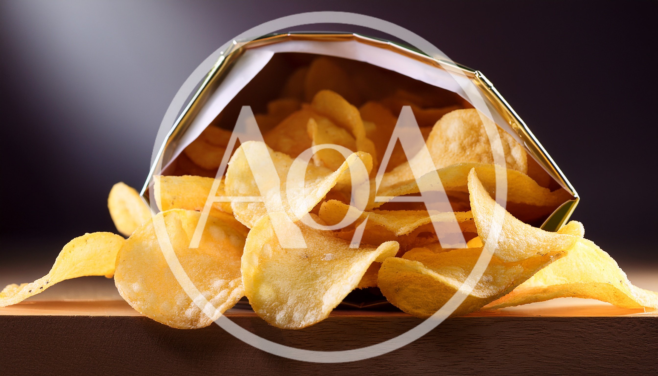 Potato Chips Spilling From An Open Bag