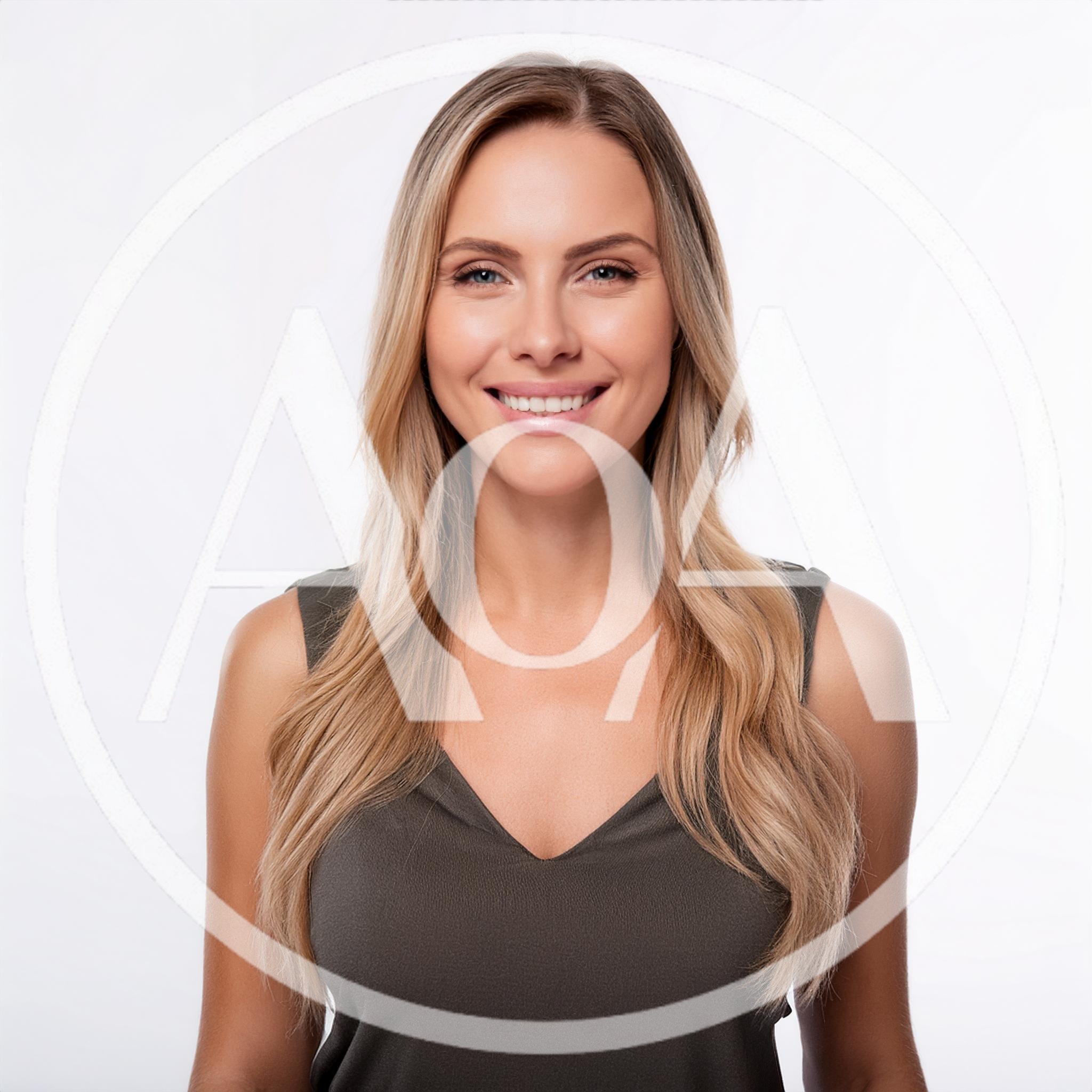 Portrait Of A Smiling Blonde Woman