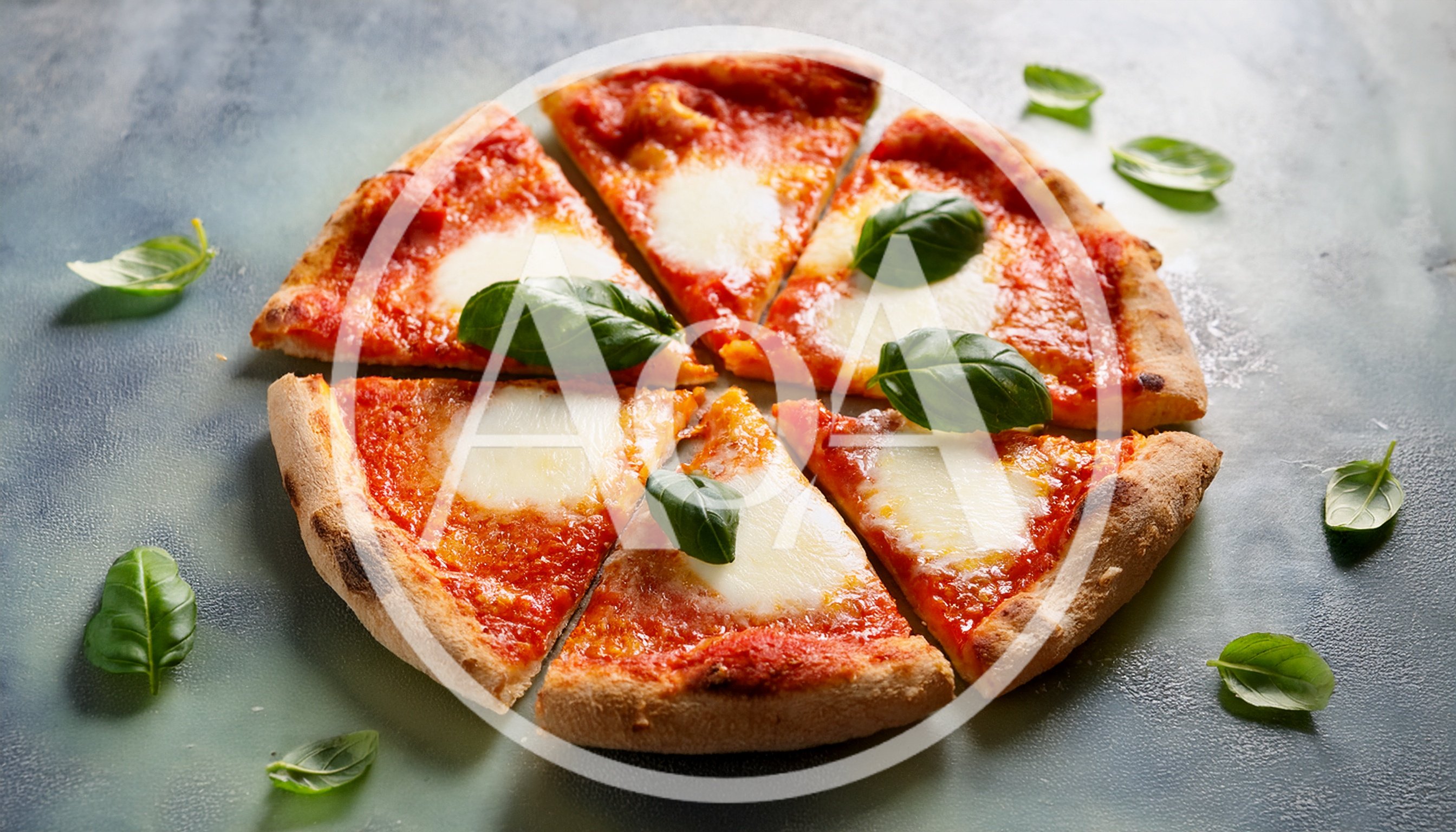 Slices Of Margherita Pizza With Fresh Basil Leaves