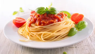 Spaghetti Pasta With Tomato Sauce And Fresh Basil