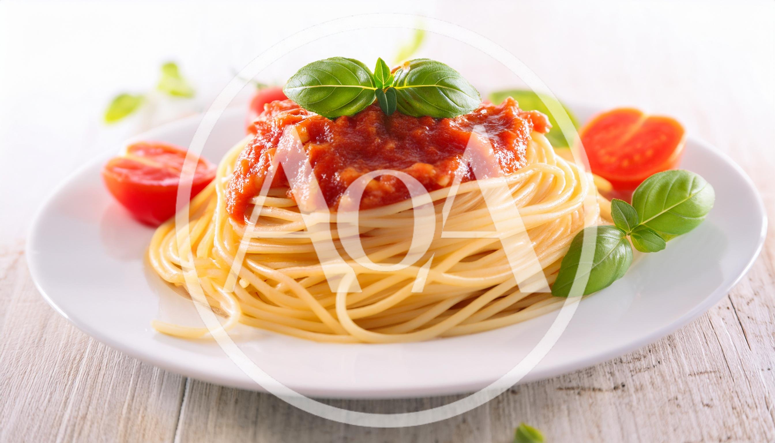 Spaghetti Pasta With Tomato Sauce And Fresh Basil