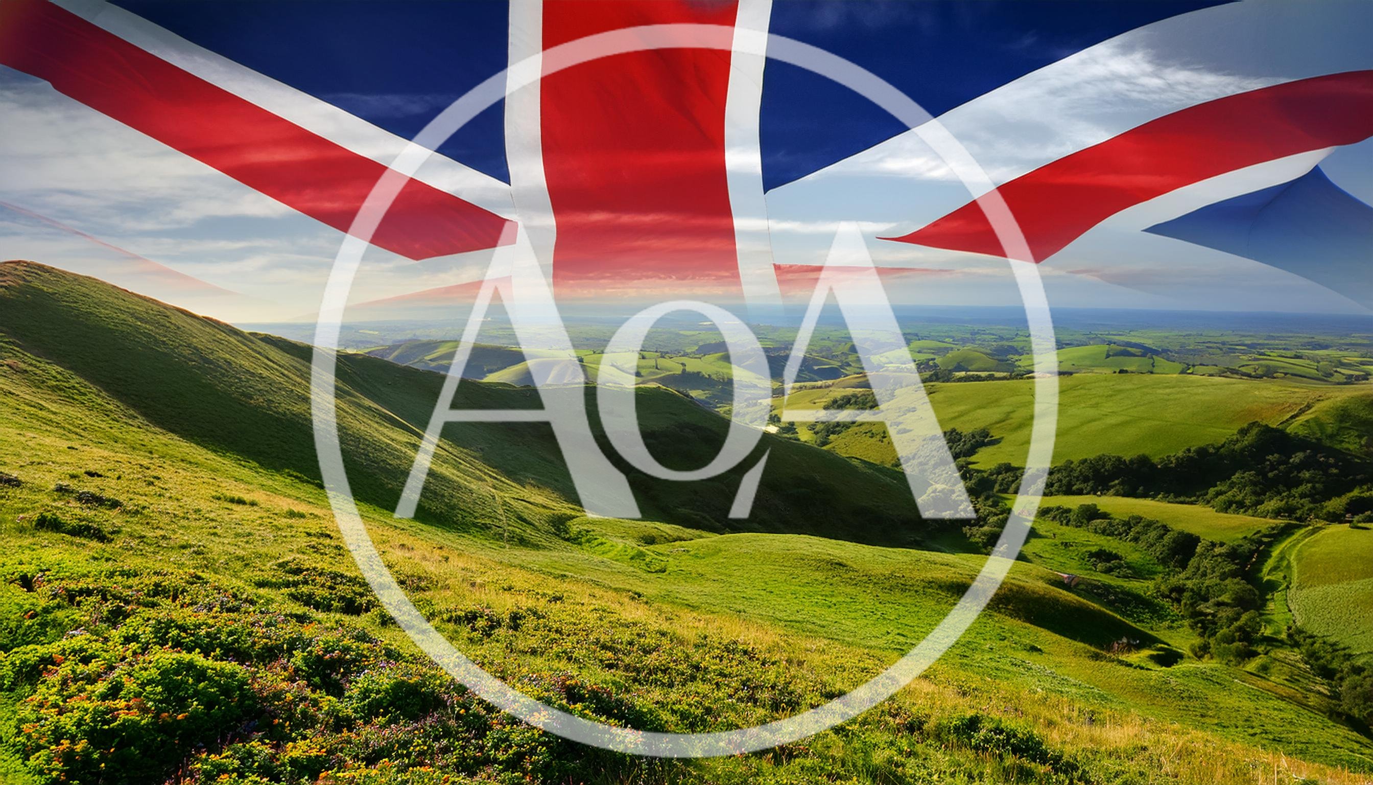 United Kingdom Flag Over Rolling Green Hills Landscape