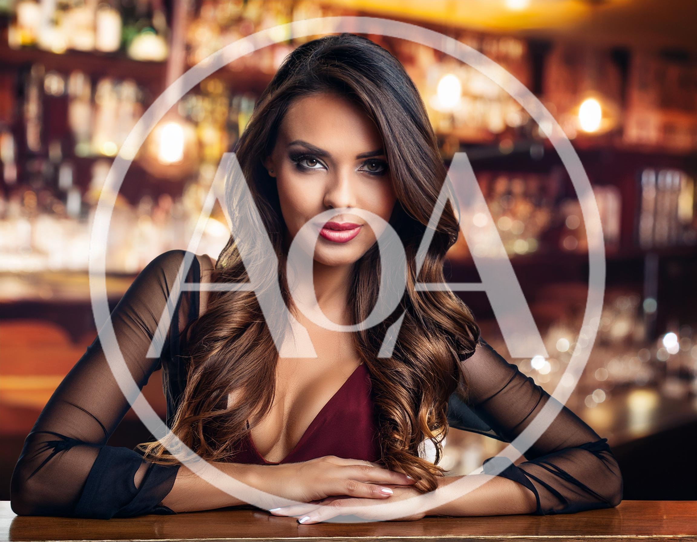 Beautiful Woman Sitting At A Bar Counter