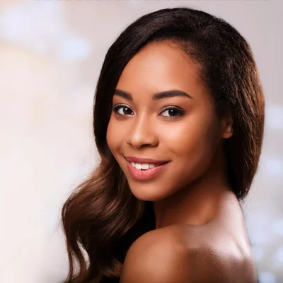 Portrait Of A Beautiful Young Woman With Radiant Skin