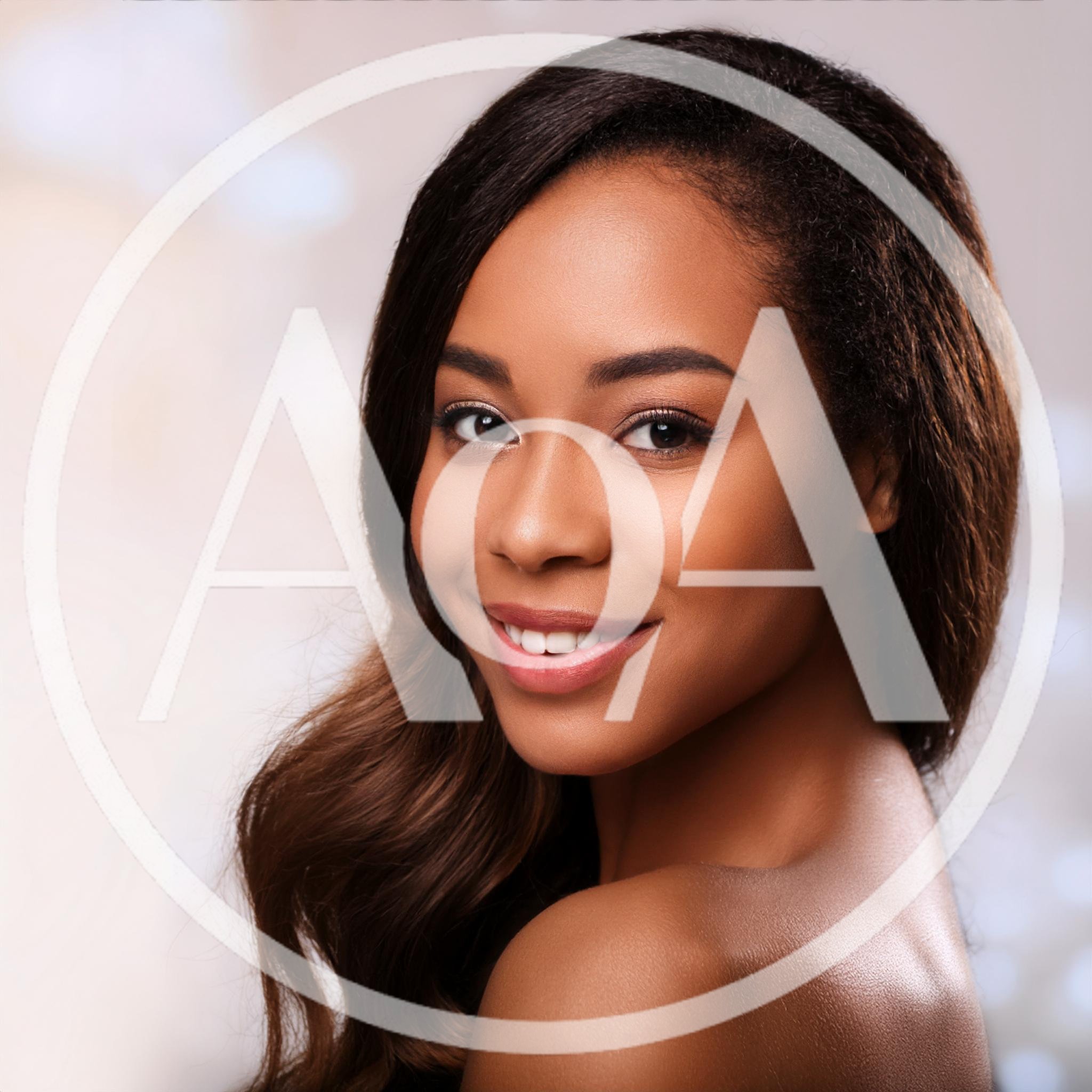 Portrait Of A Beautiful Young Woman With Radiant Skin
