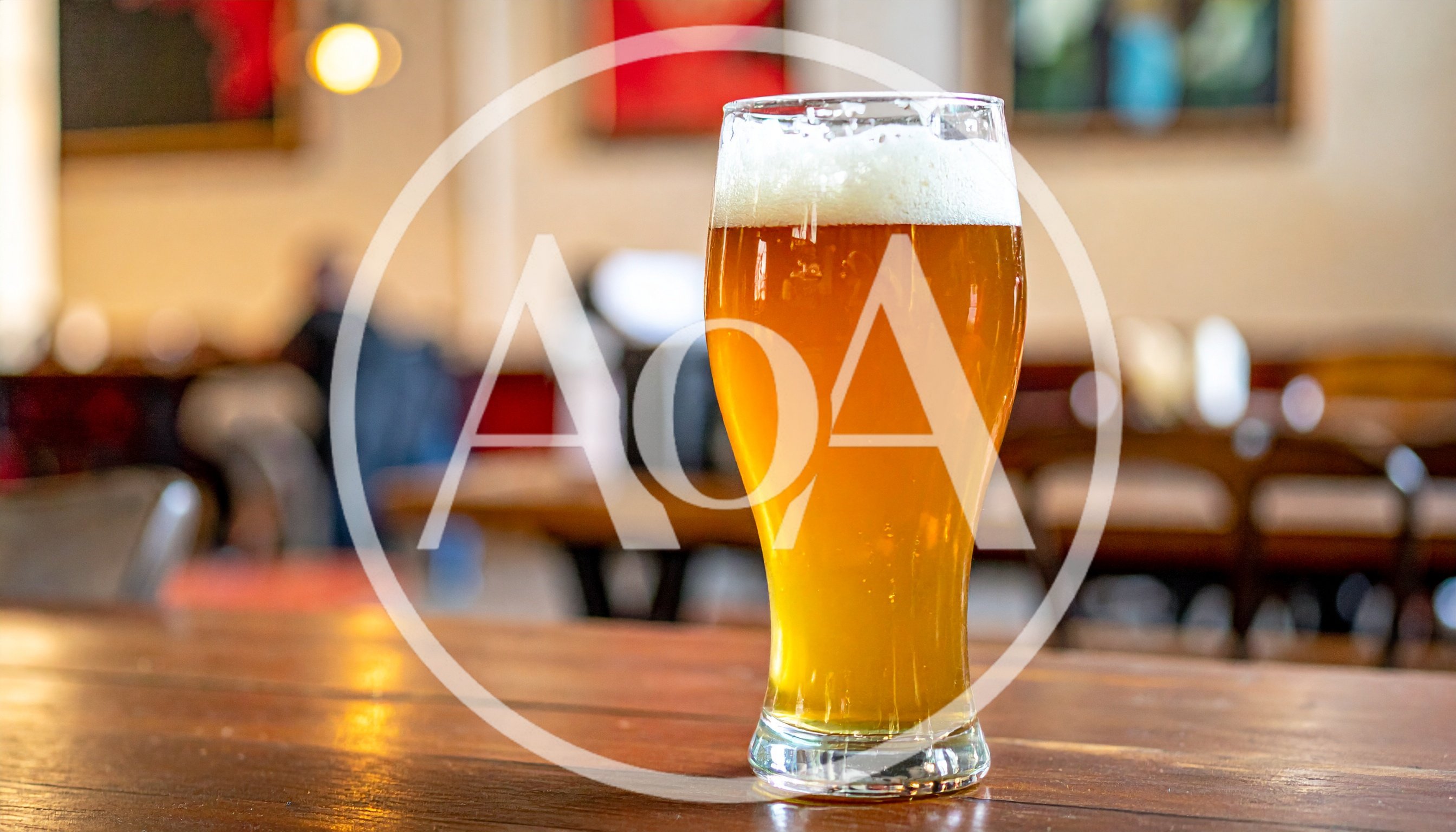 Glass Of Cold Beer On A Wooden Table