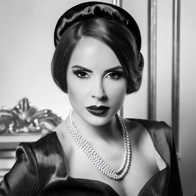 Elegant Woman Wearing Vintage Style Pearl Necklace