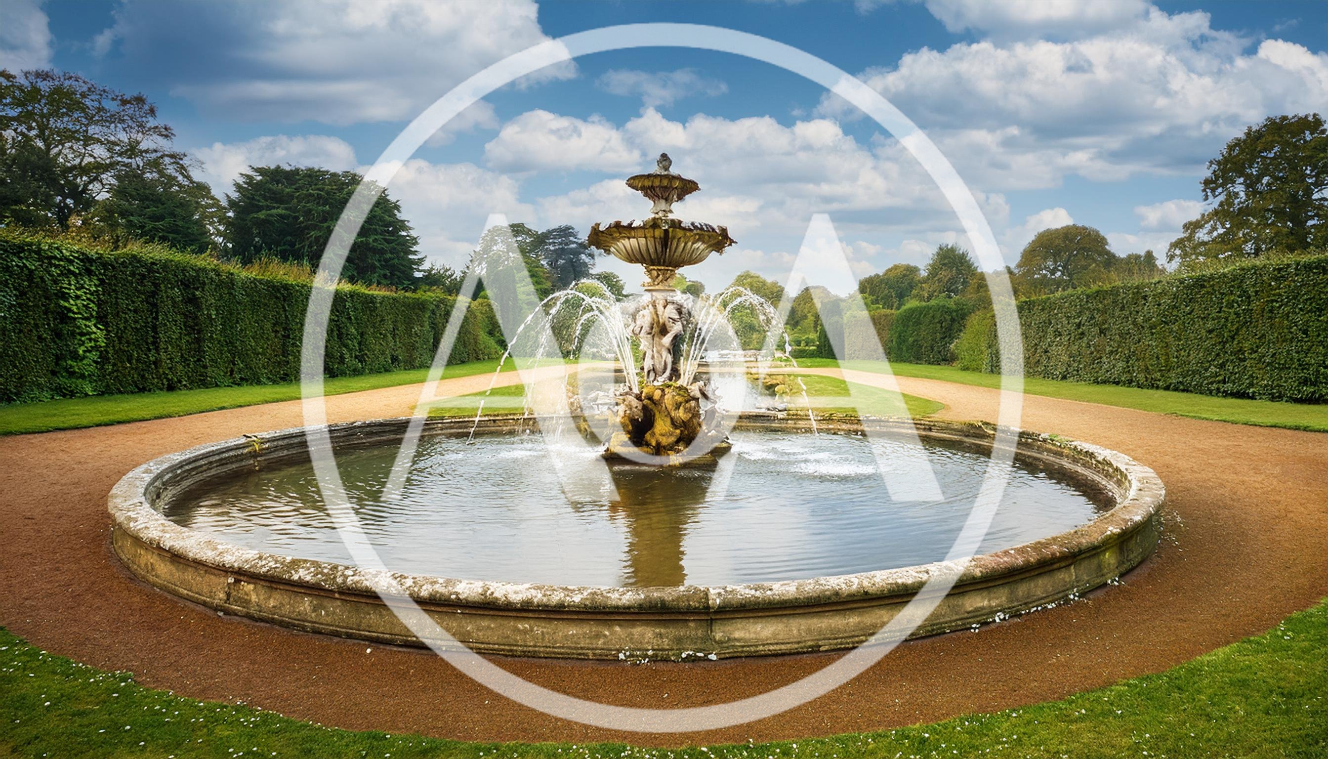 Ornate Stone Fountain in a Formal English Garden