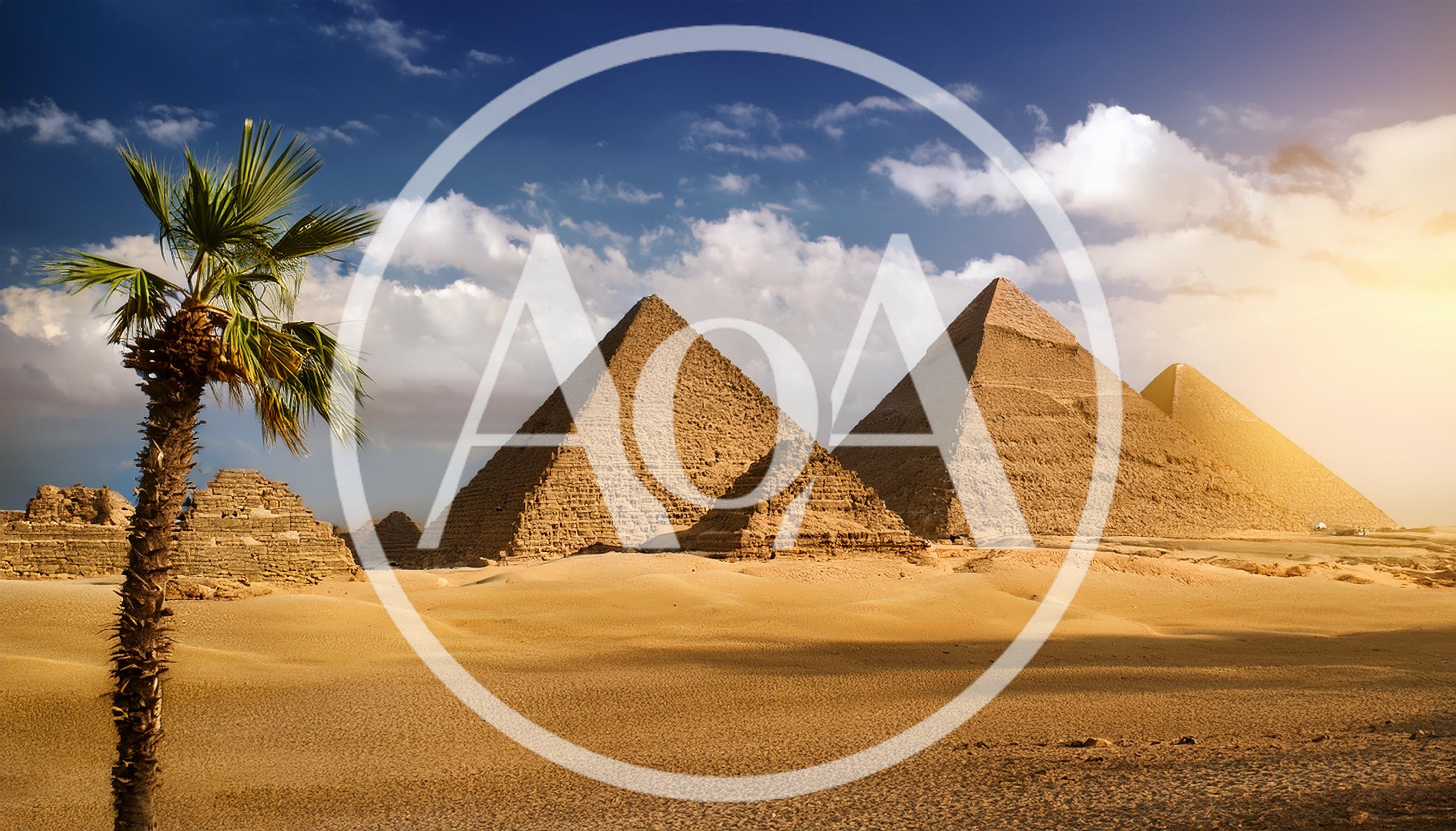 The Great Pyramids of Giza Under Sunny Desert Sky