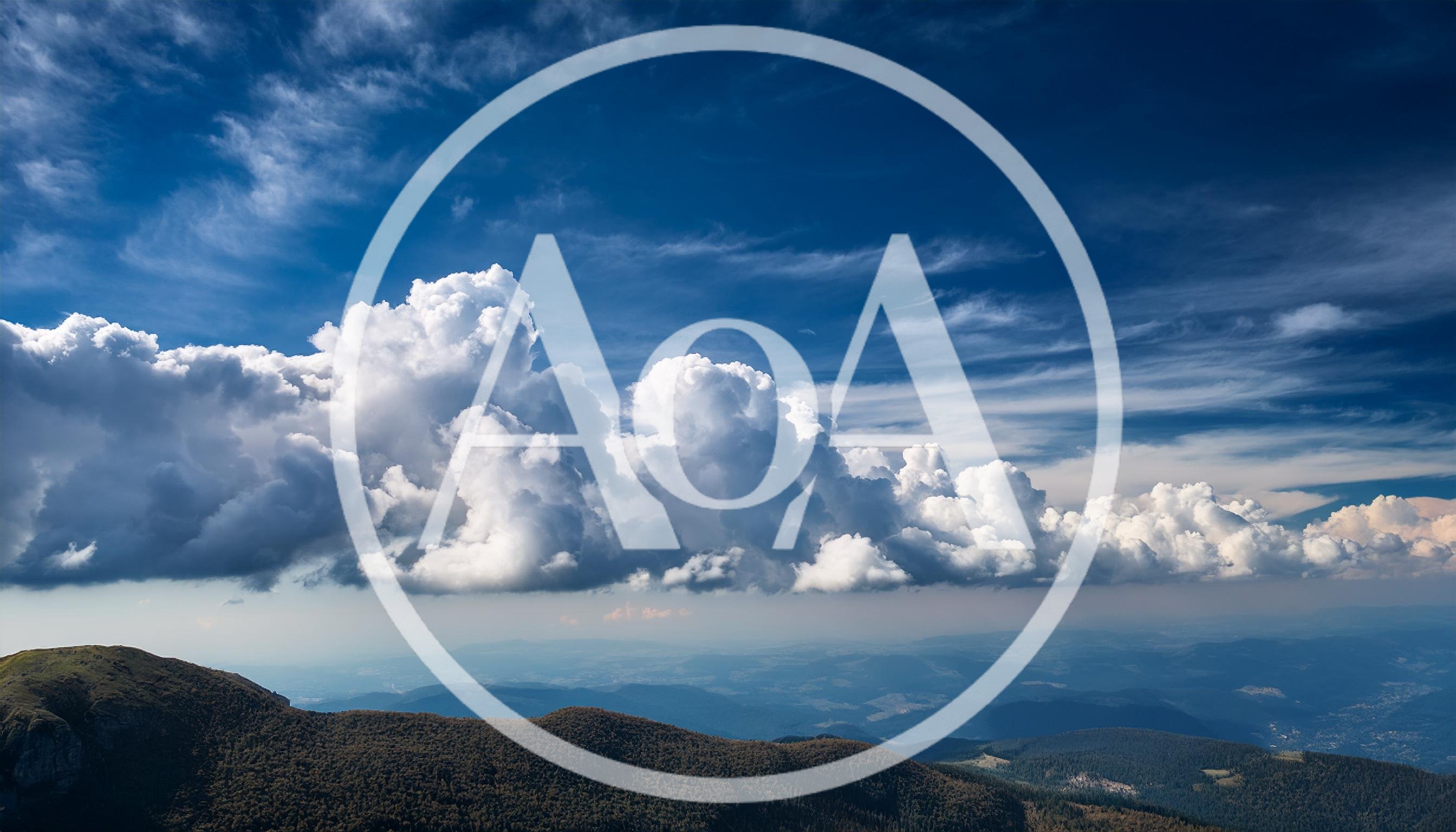 Dramatic Cumulus Clouds Over A Mountain Range