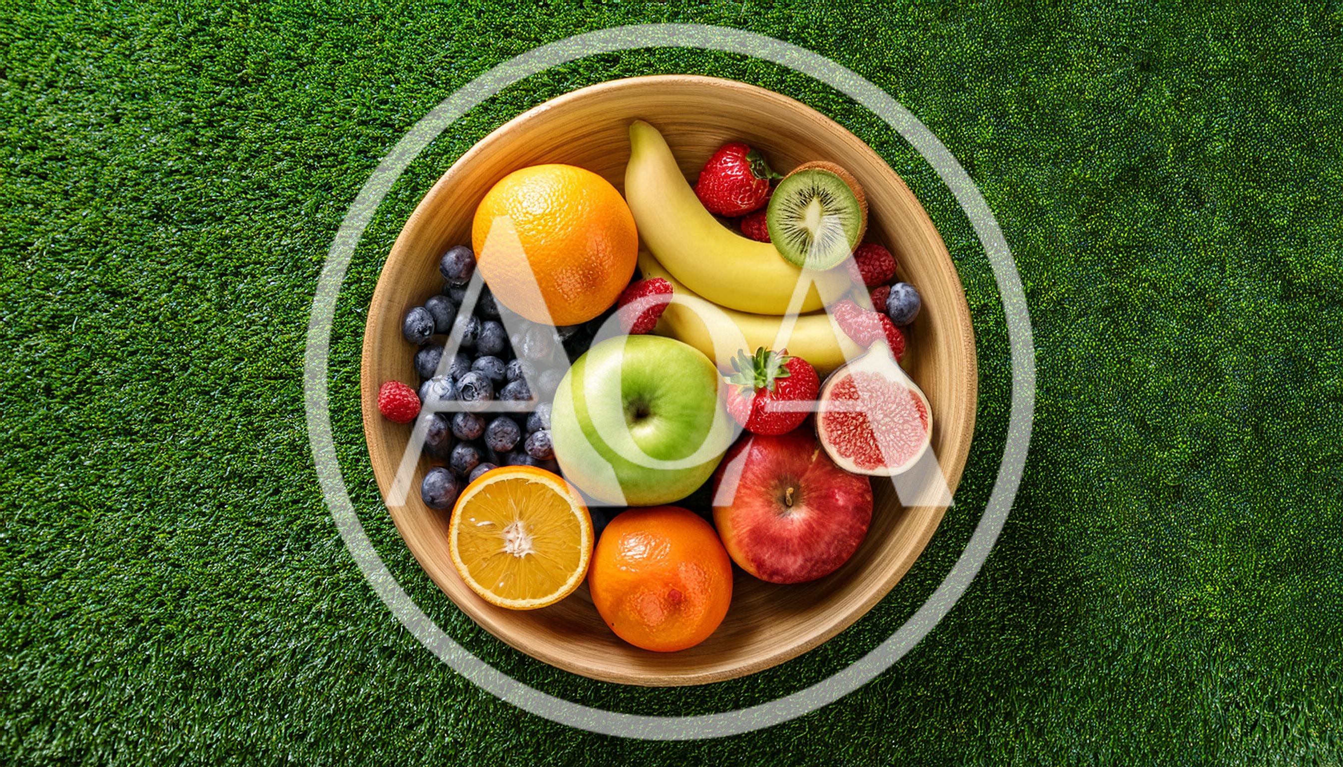Fresh Assorted Fruits In A Wooden Bowl