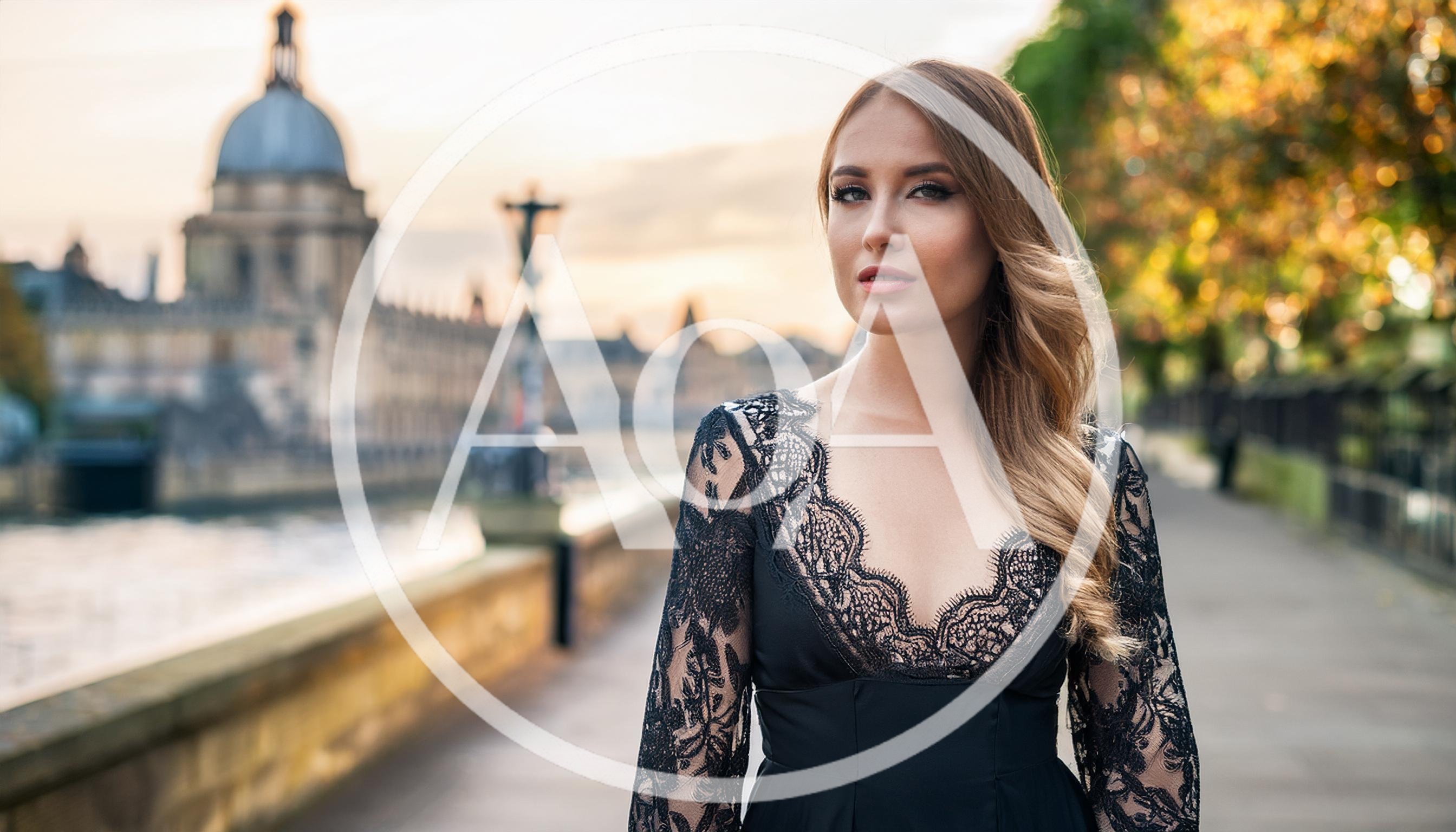 Elegant Woman In Black Lace Dress Standing By River