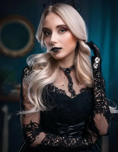 Portrait Of A Blonde Woman In Gothic Lace Attire
