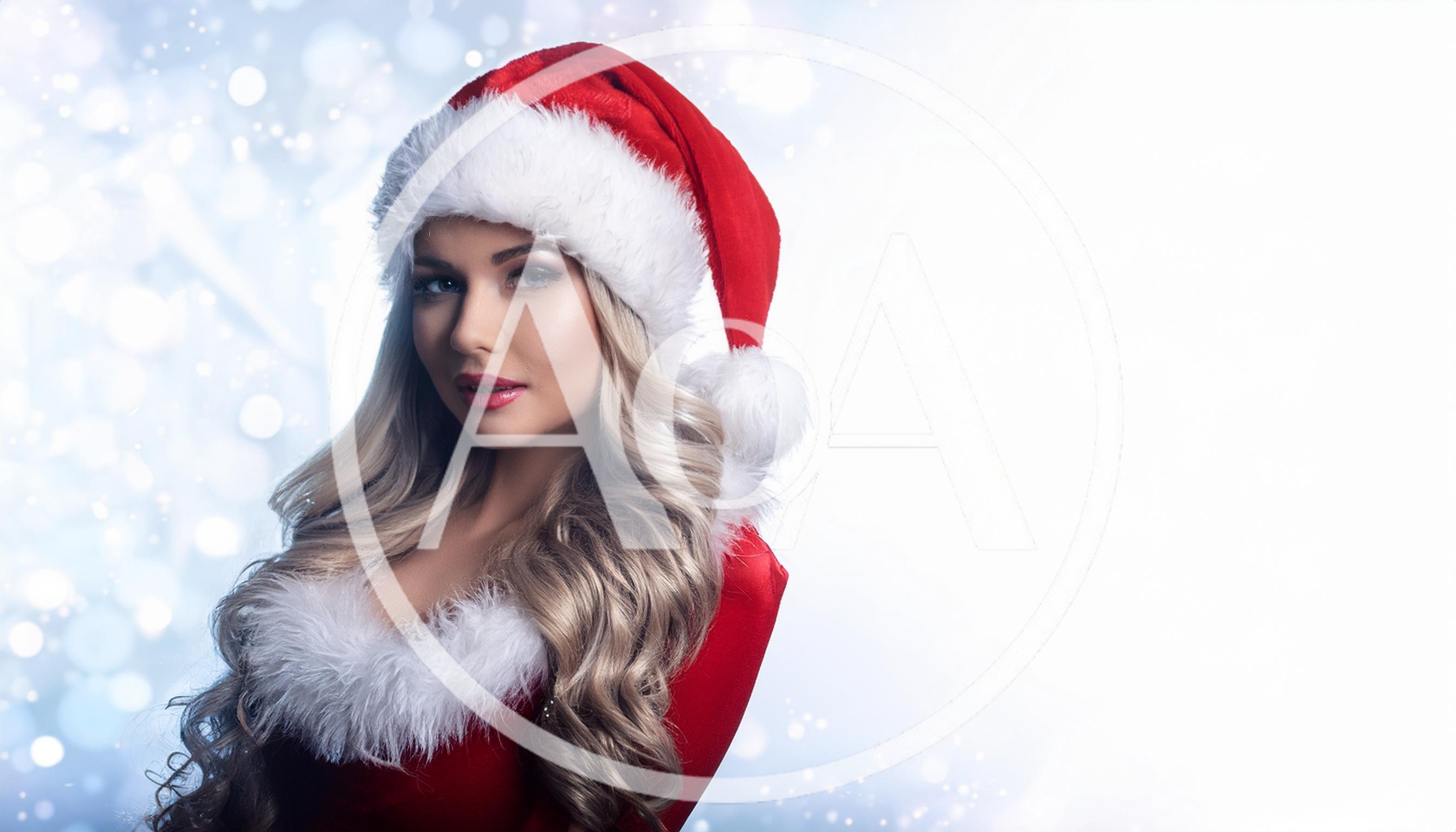 Beautiful Blonde Woman Wearing A Santa Claus Costume