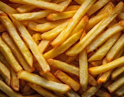 Golden Crispy French Fries Background