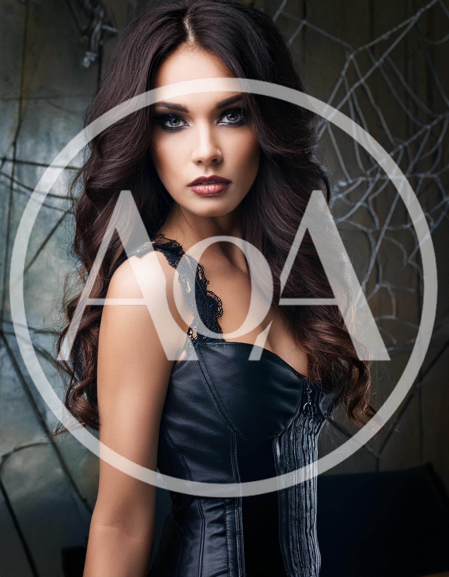 Portrait Of A Beautiful Woman In A Leather Corset
