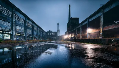 Abandoned Industrial Factory Complex At Night