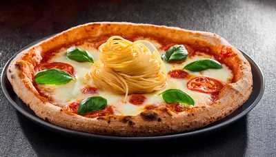 Gourmet Pizza Topped With A Nest Of Spaghetti