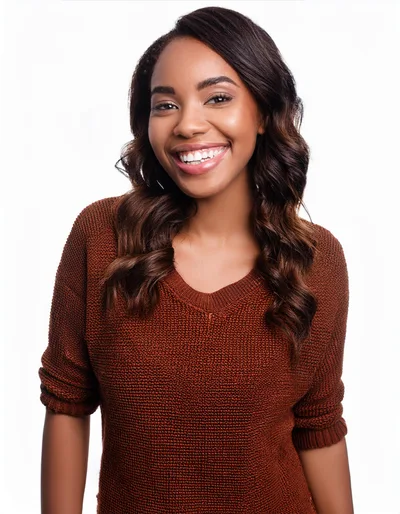 Portrait Of A Smiling Young Woman In Brown Sweater