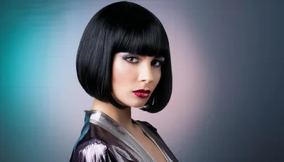 Portrait Of A Woman With A Black Bob Hairstyle
