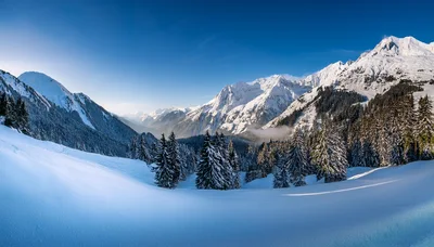 Panoramic View Of Snowy Alpine Mountains In Winter