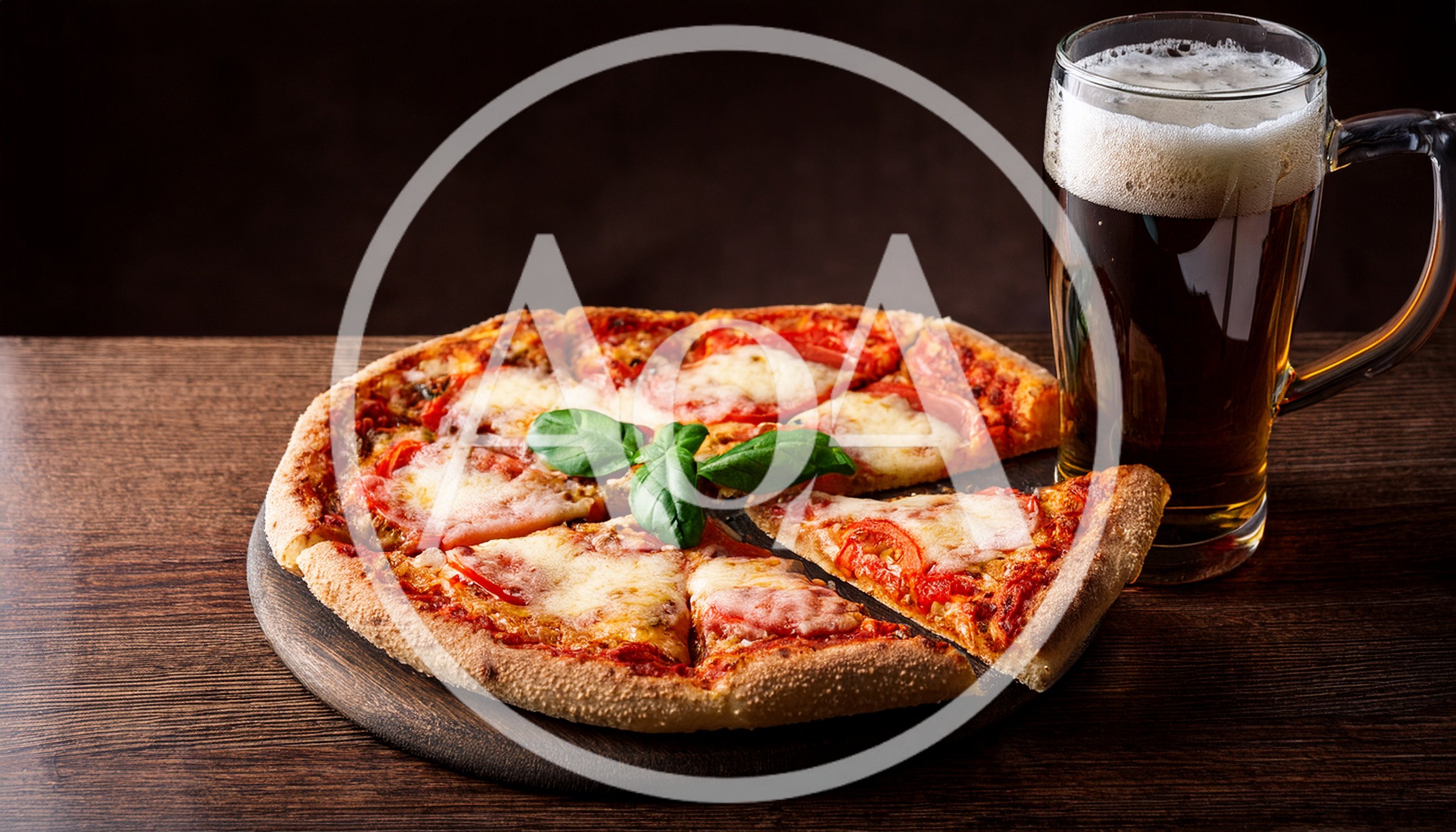 Fresh Pizza With Basil And A Glass Of Beer