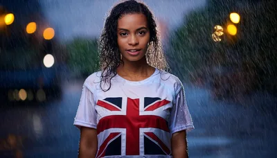 Young Woman Wearing Union Jack Shirt In Rain