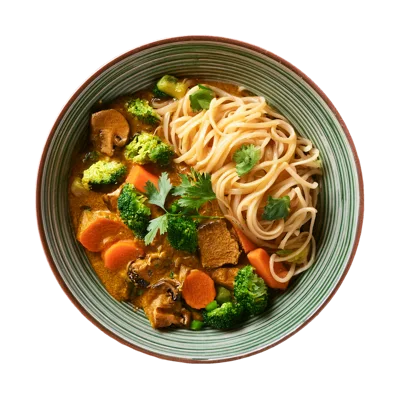 Bowl Of Thai Curry With Noodles And Vegetables