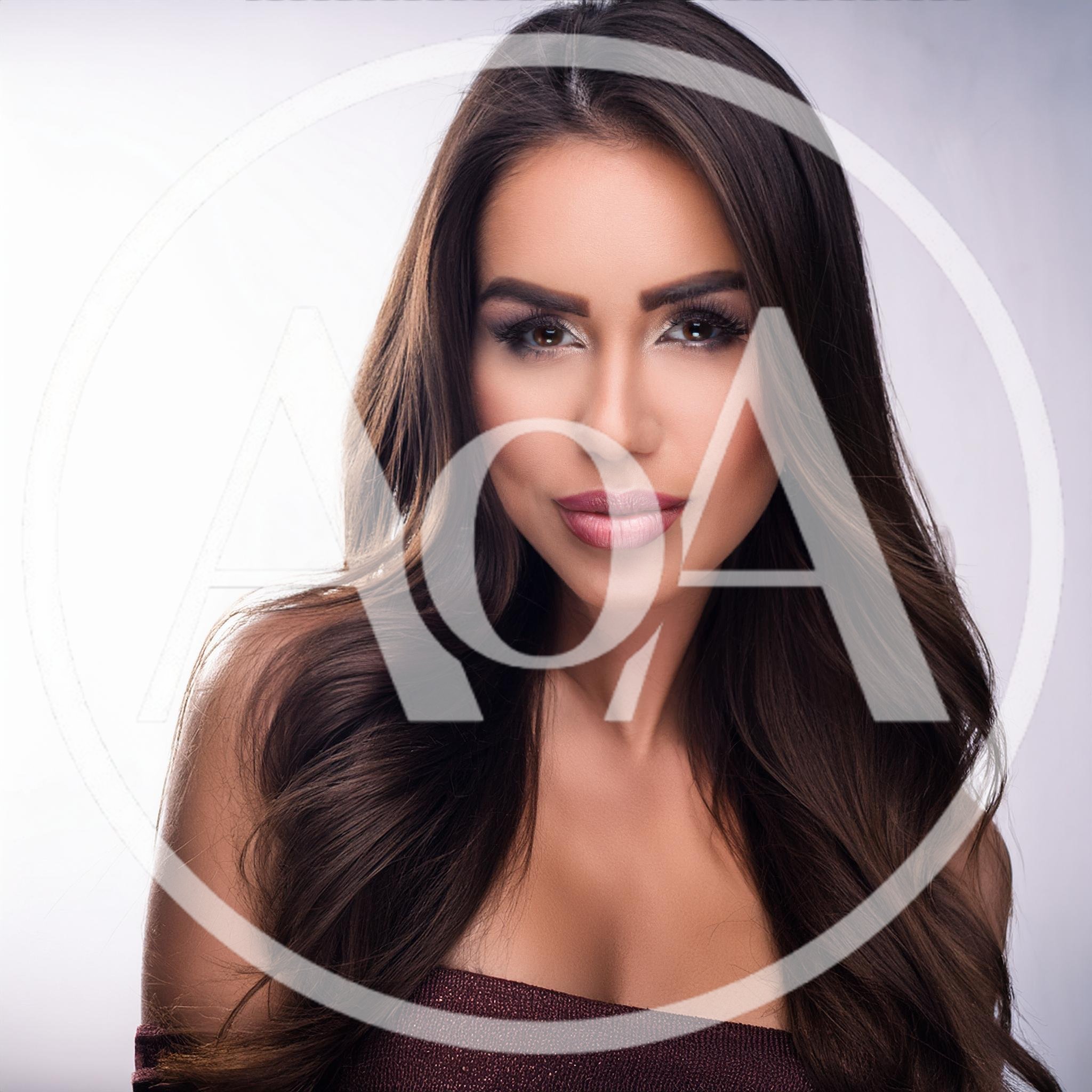 Portrait Of A Beautiful Woman With Long Wavy Hair