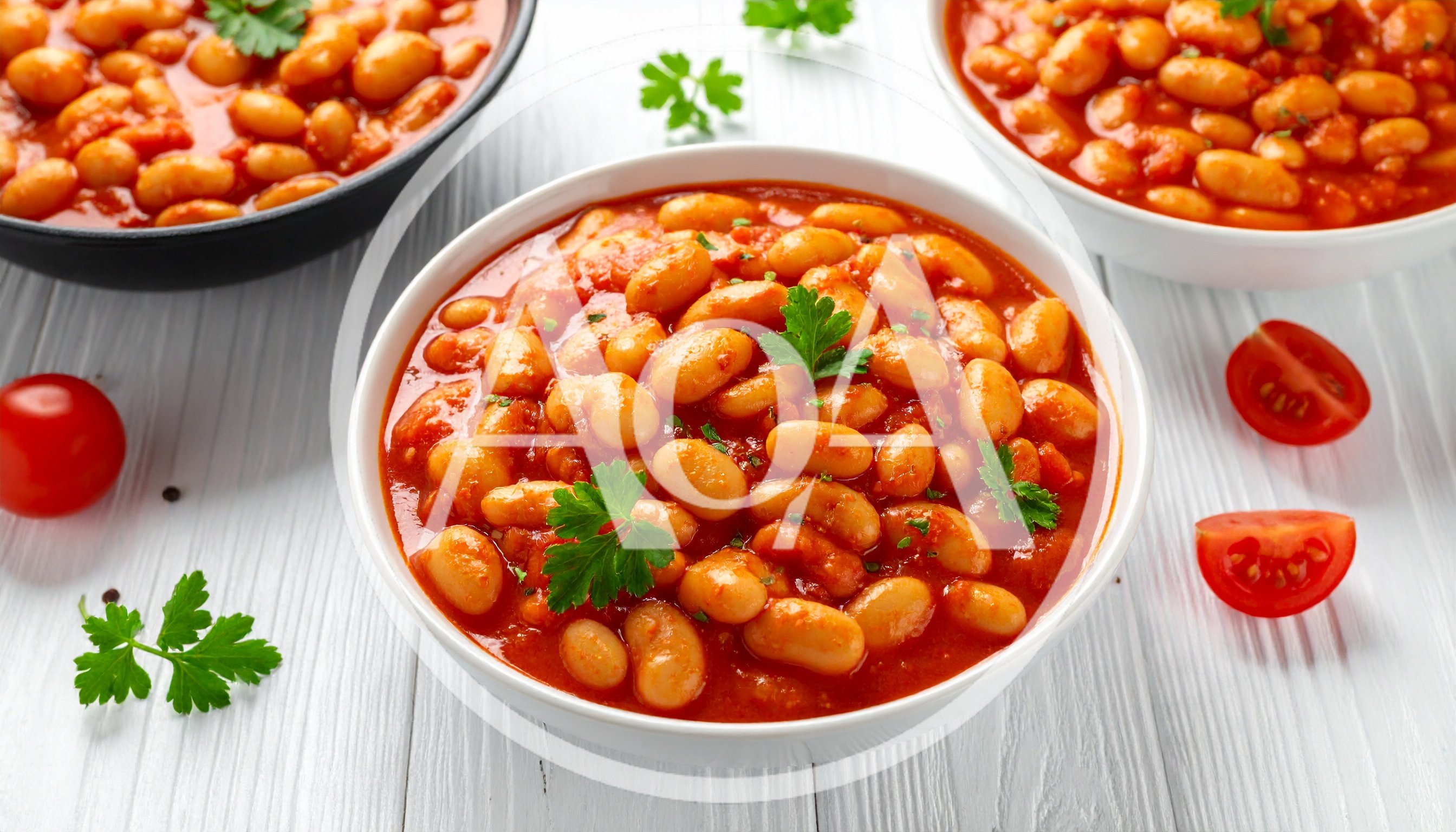 Three Bowls Of Baked Beans In Tomato Sauce