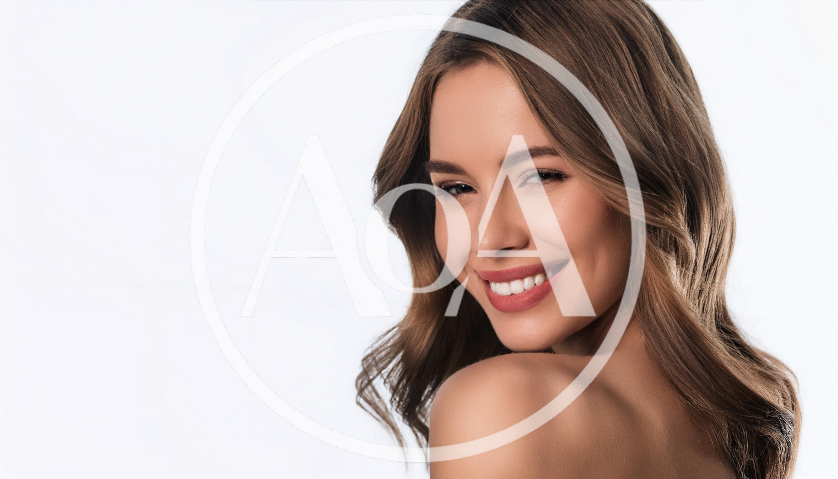 Beautiful Young Woman Smiling At Camera