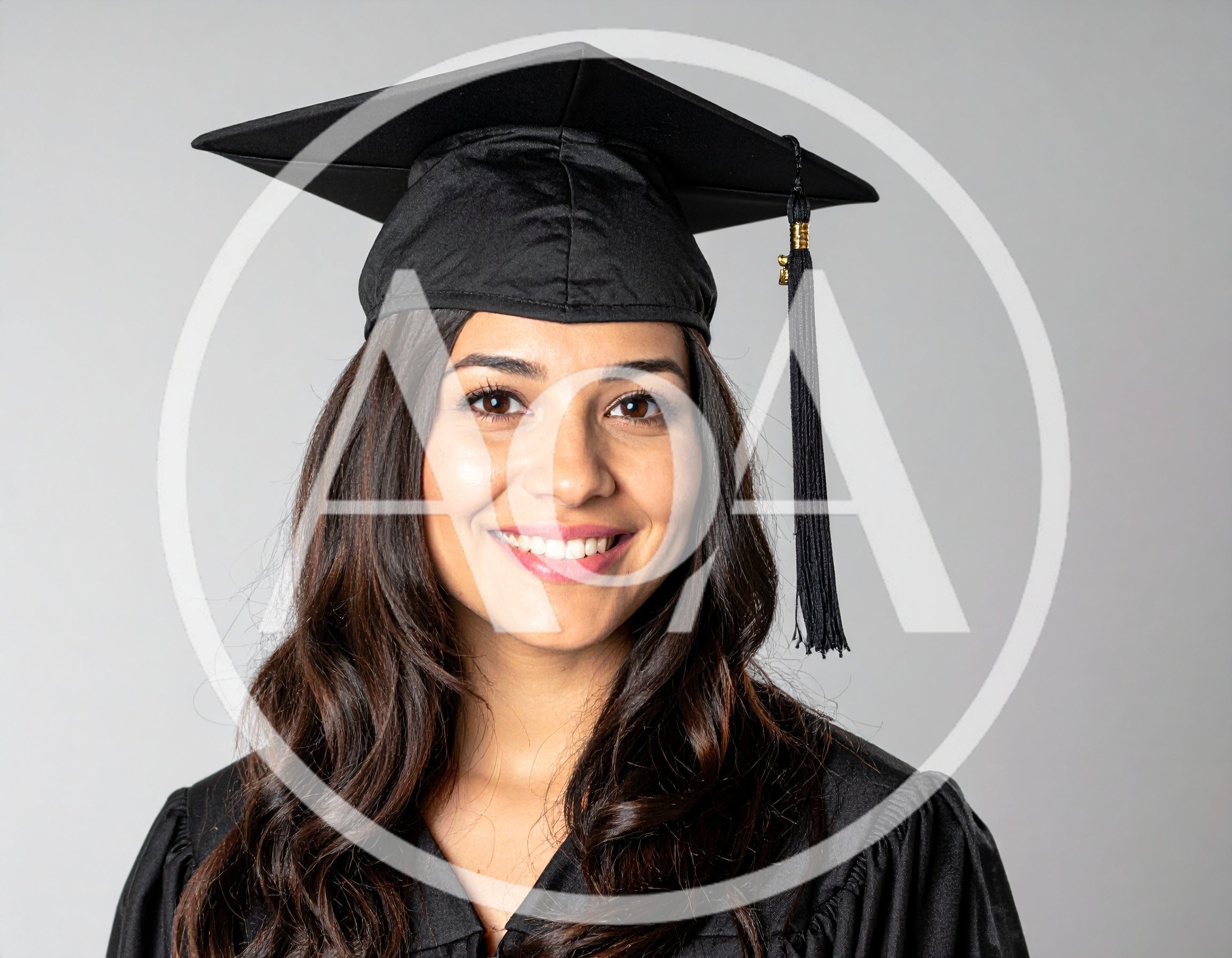 Smiling Female Graduate Wearing Cap And Gown