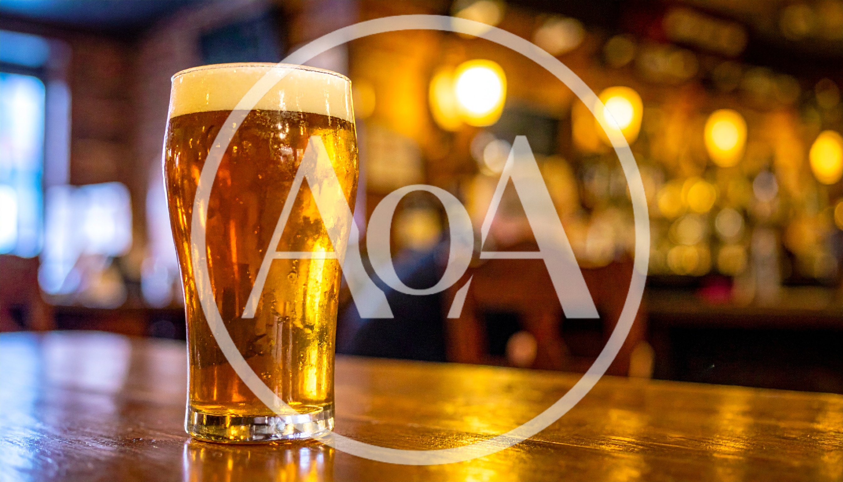 Pint Of Golden Beer On A Pub Bar Counter