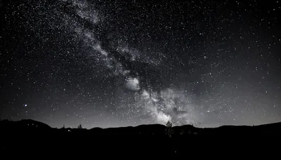 Milky Way Galaxy Over Dark Mountain Silhouette