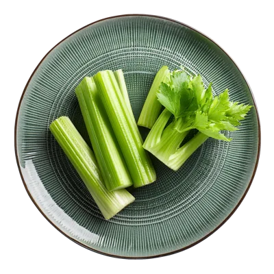 Fresh Celery Stalks Arranged On A Textured Green Plate