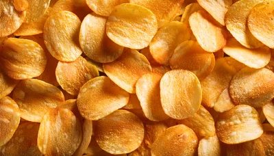Top Down View Of Crispy Golden Potato Chips