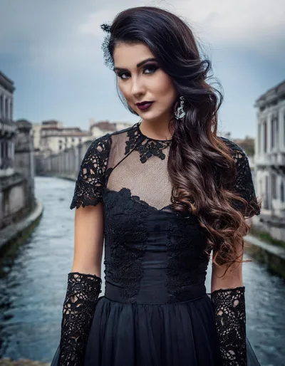 Elegant Woman In Black Lace Dress Standing On Bridge
