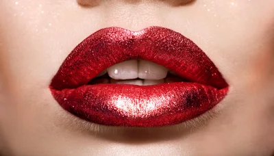 Close Up Of Woman With Glittery Red Lipstick