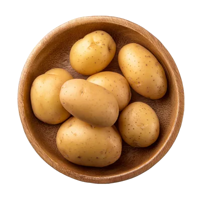 Fresh Raw Potatoes In A Wooden Bowl