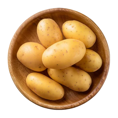 Fresh Raw Potatoes In A Wooden Bowl