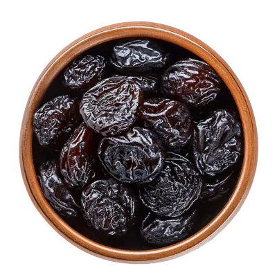 Top View Of Dried Prunes In A Ceramic Bowl