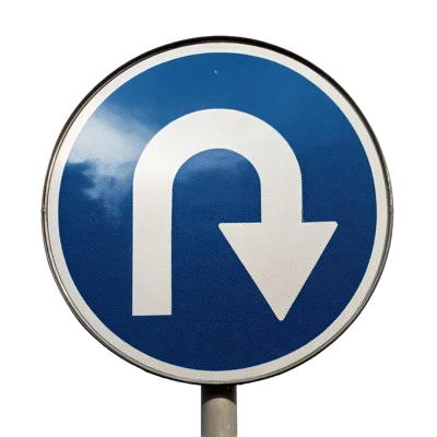 U-Turn Mandatory Traffic Sign On Metal Pole