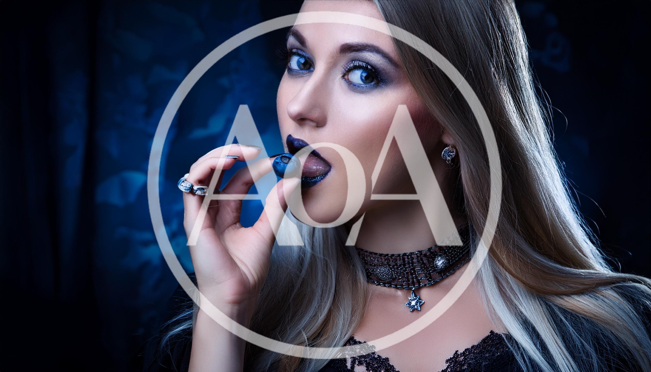 Gothic Woman Eating A Fresh Blueberry