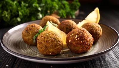 Fresh Falafel Balls Served On A Ceramic Plate